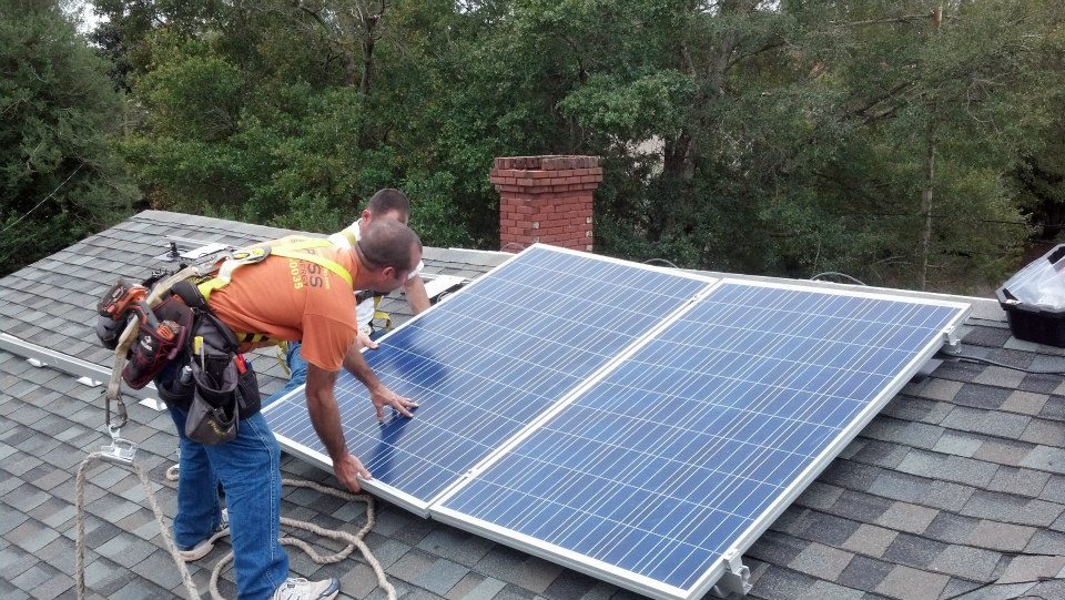 Solar panels being installed on a home in Pensacola, Florida.