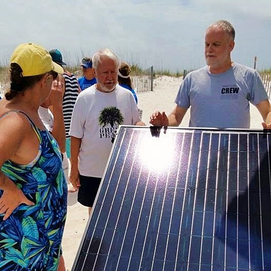 transition to clean energy and decentralize utilities, Florida Solar